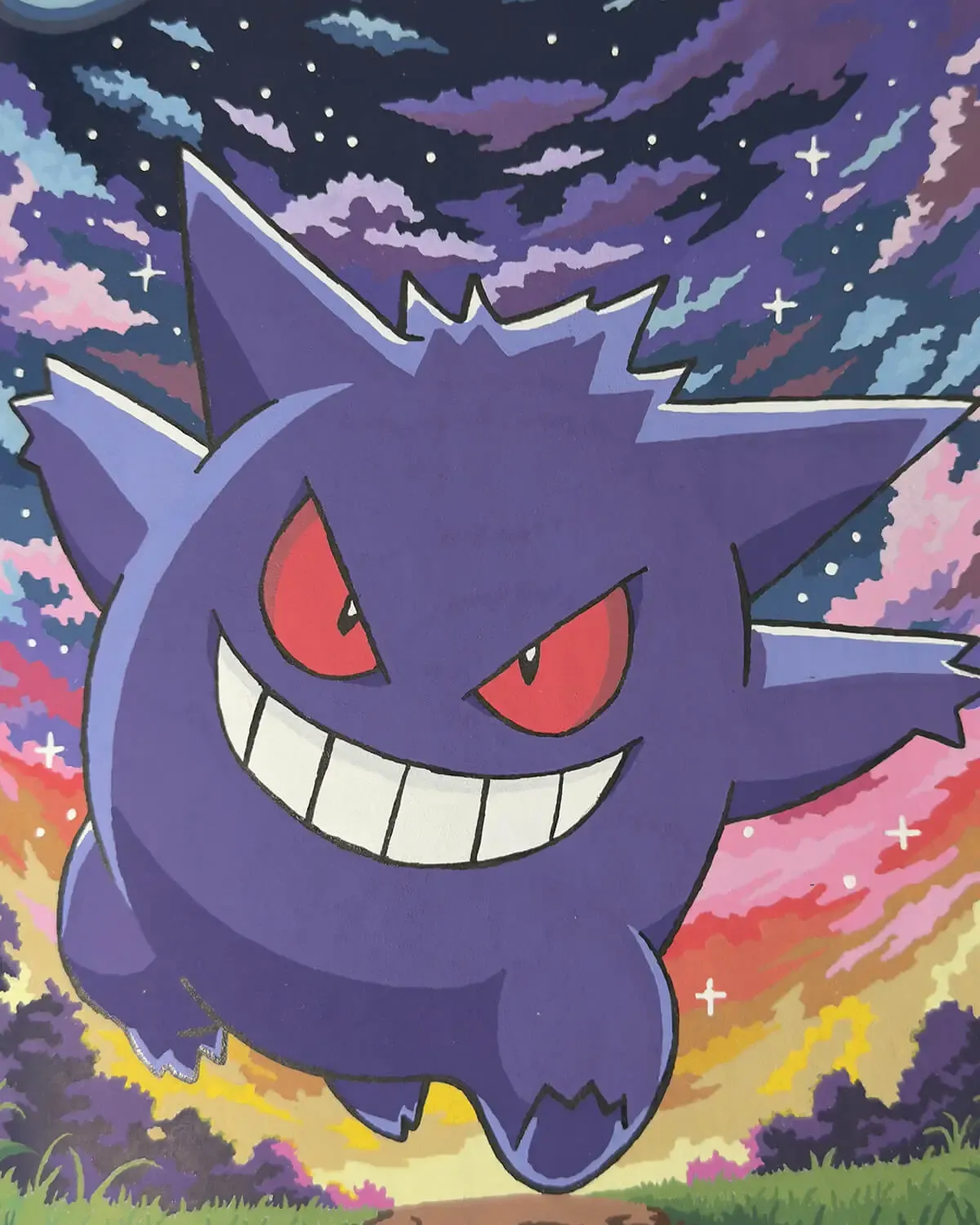 Completed colour-by-number page of Gengar against a colourful night sky.